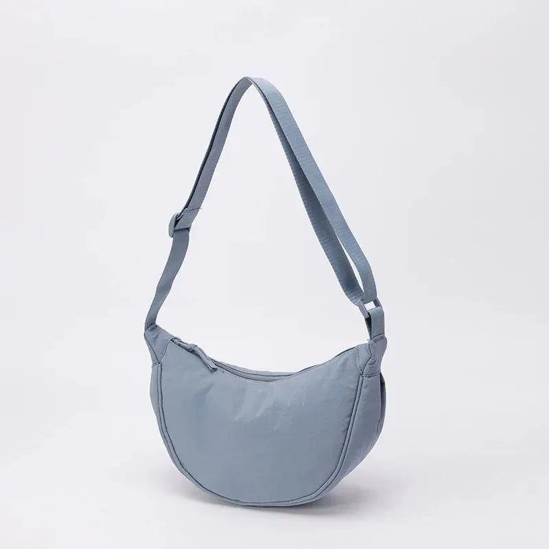 Nylon crossbody bag by Simples Market, crescent dumpling shape in light blue, large capacity