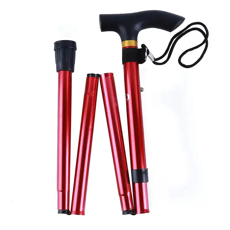Telescopic walking stick by Simples Market; red aluminum alloy folding cane with black handle and wrist strap