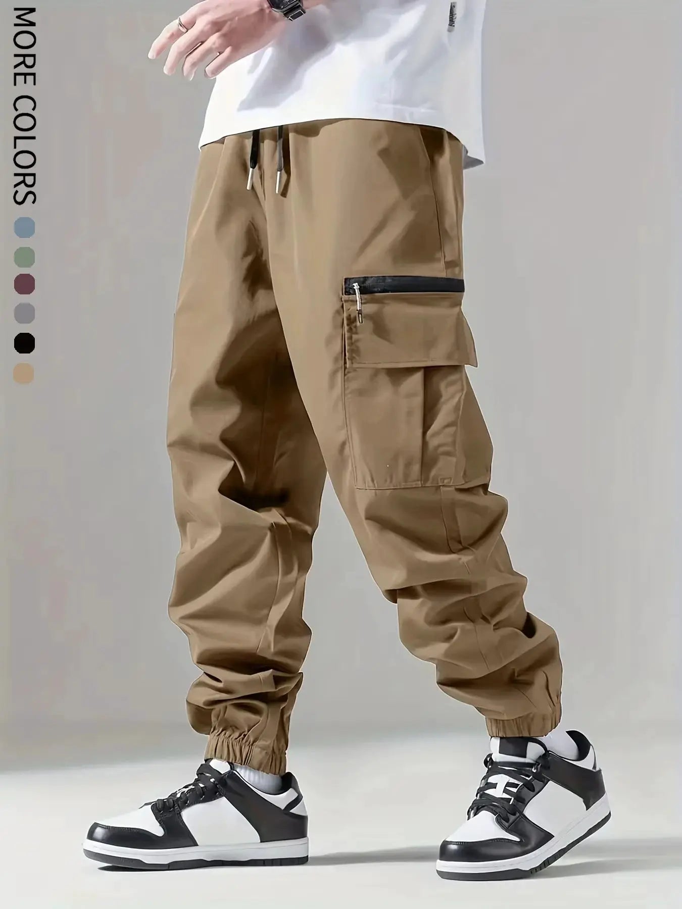 Simples Market men's tan cargo pants with multiple pockets, including zip pocket; breathable outdoor pants.