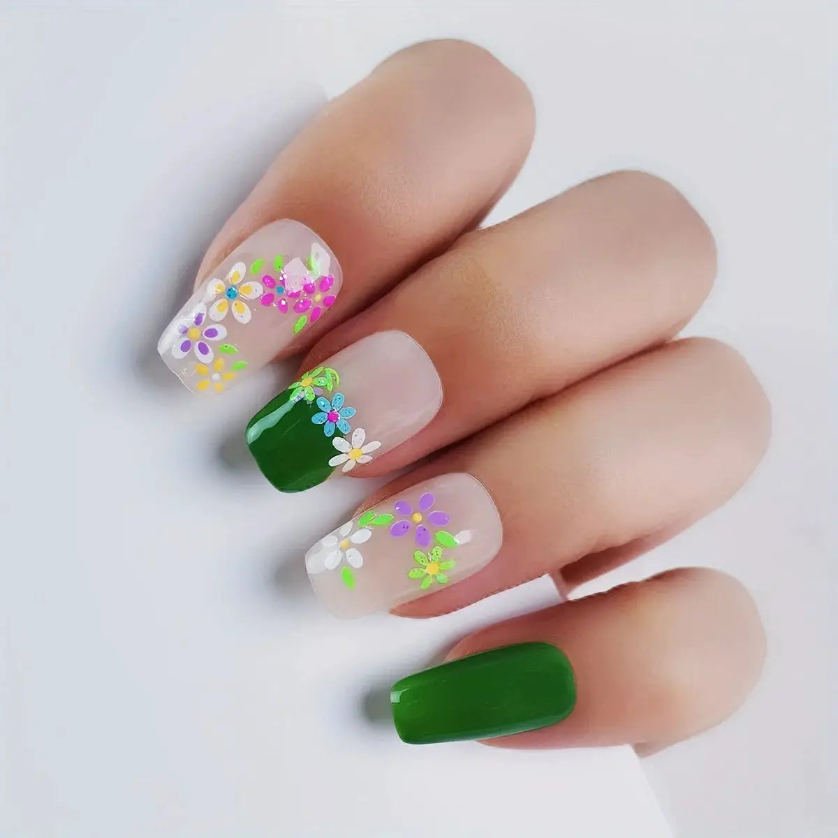 Simples Market nail stickers; glow-in-the-dark neon floral designs on nude and green nails, glossy self-adhesive
