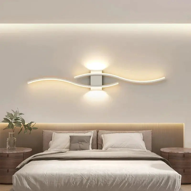Moder LED wall lamp long strip by Simples Market with curved white light bars for warm bedroom lighting.