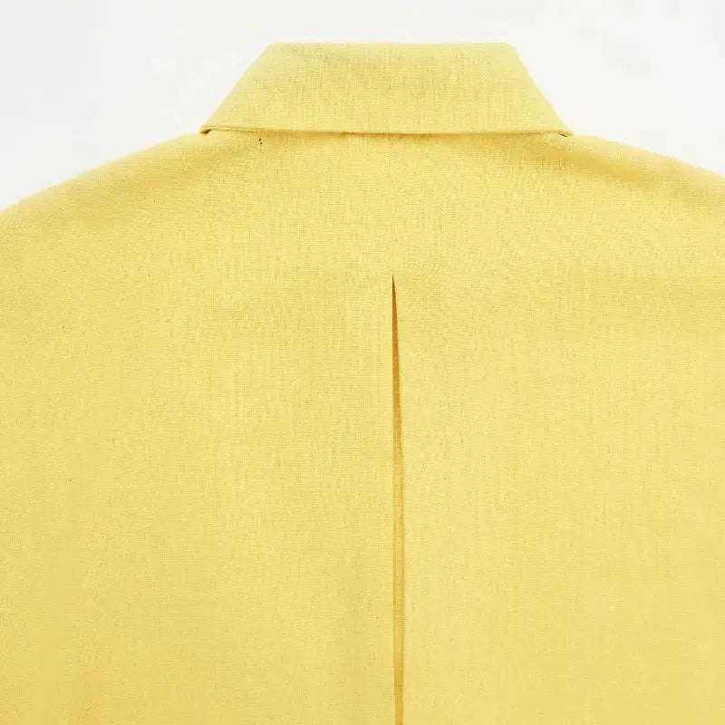 Women's casual yellow shirt by Simples Market with collar and back slit detail
