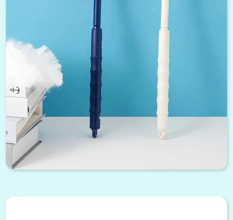 Extended-pole dust collector with blue and white handles and disposable fiber cloth duster on a clean tabletop.