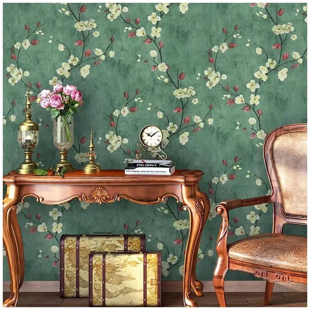 Floral grey peel-and-stick wallpaper with green background and cream blossoms; self-adhesive and removable.
