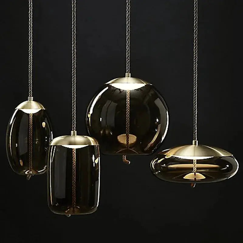 Pendant lamp set of four: amber glass pendants with brass caps and braided cords