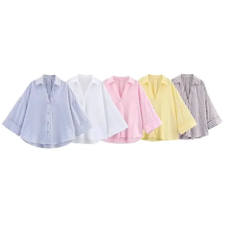 Six women's button-up shirts in assorted colors including blue striped, white, pink, yellow, and brown striped.