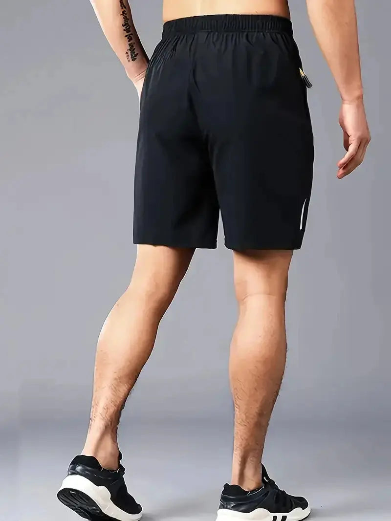 Men's black breathable sports shorts with elastic waistband, knee-length athletic wear