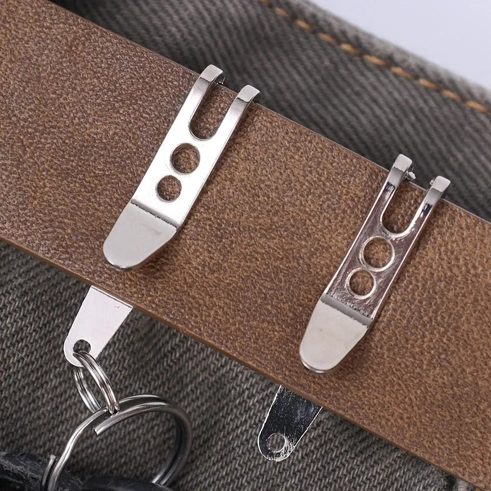 Pair of silver EDC pocket suspension clips with key carabiner on a brown strap