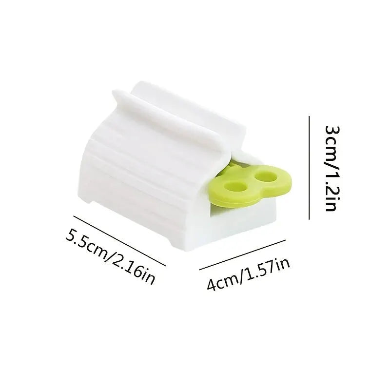 Toothpaste tube squeezer by Simples Market, white plastic with lime-green lever, compact.