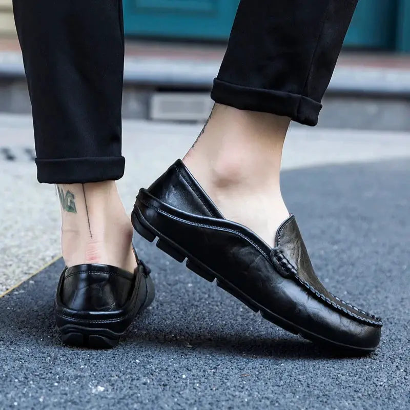 Men's black genuine leather loafers, slip-on moccasin style with stitched detail