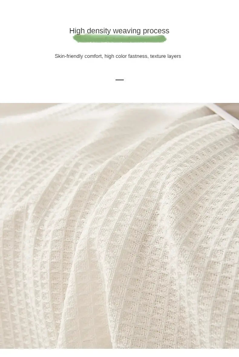 Sofa cushion cover in cream wind-cotton yarn with waffle texture, Simples Market.