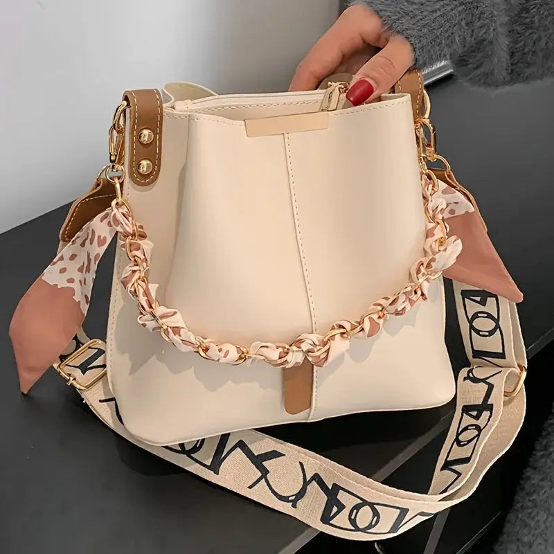 Cream bucket bag with pink ribbon chain, large capacity, crossbody strap