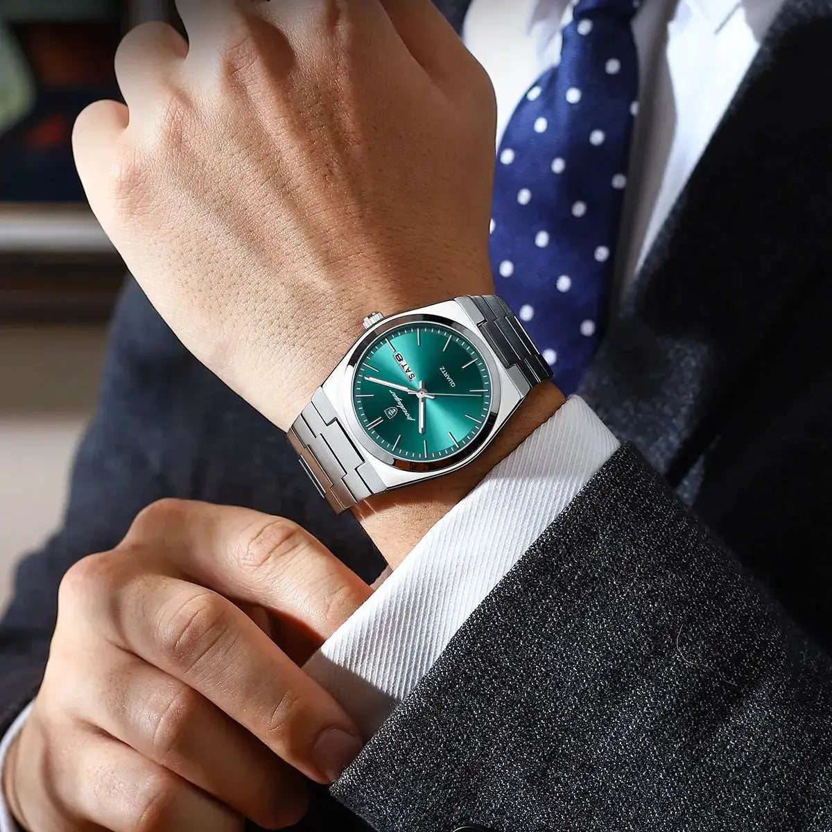 POEDAGAR luxury men's stainless steel wristwatch with teal dial, waterproof design and date window on metal bracelet