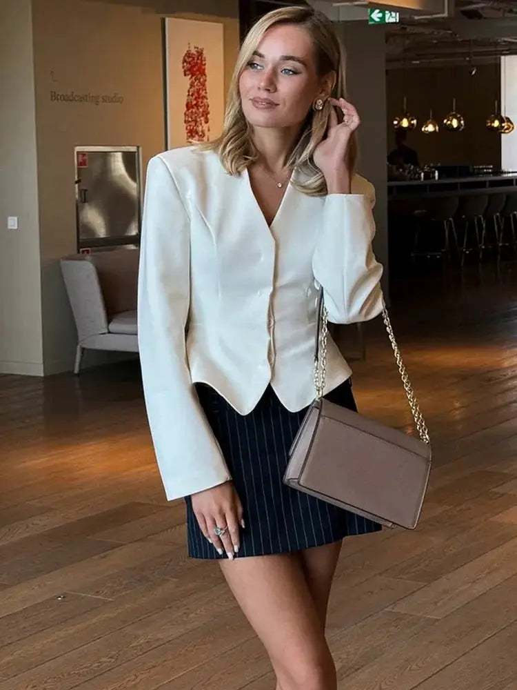 Trendix Elegant Blazer 2 Piece Sets: white tailored blazer with V-neck and navy pinstripe skirt, beige chain-strap bag