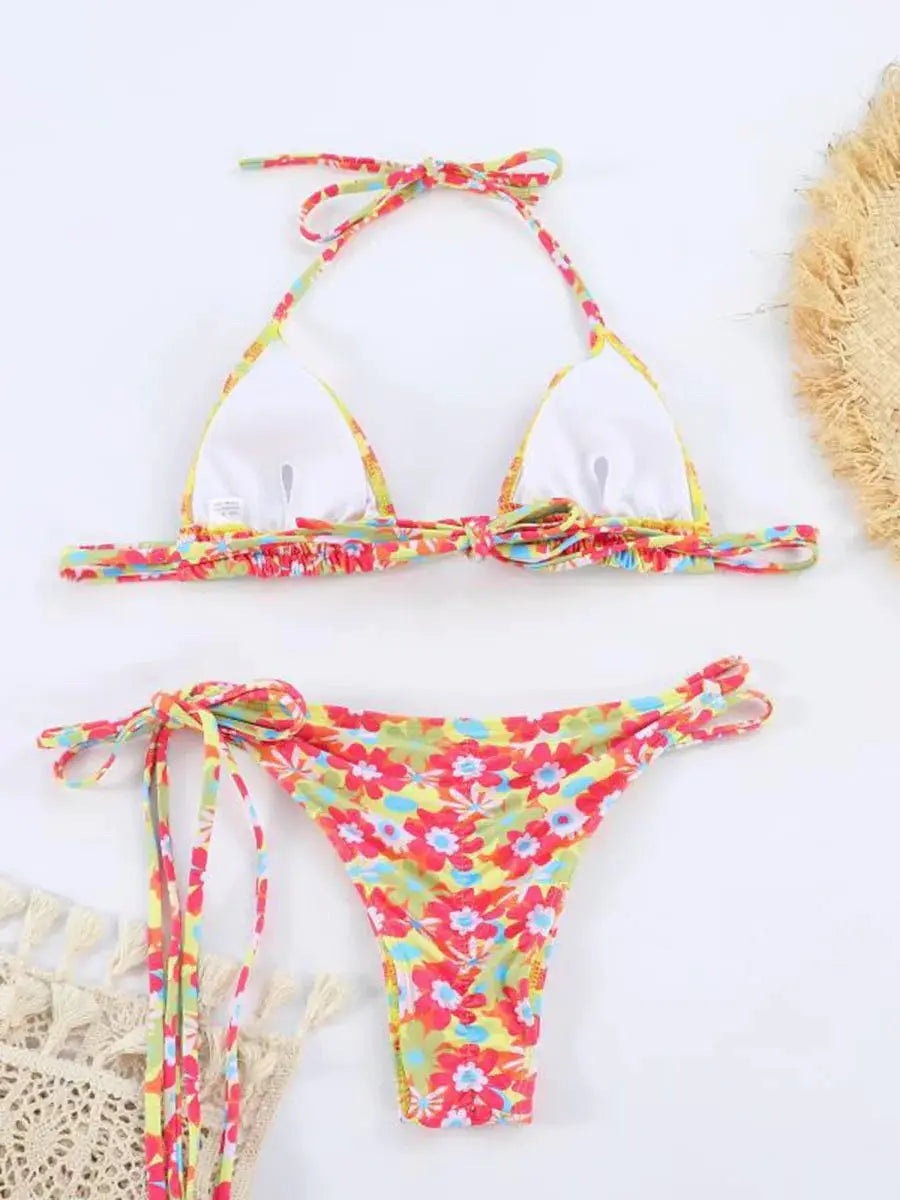 Two-piece colorful floral bikini set with tie-side bottoms and halter top