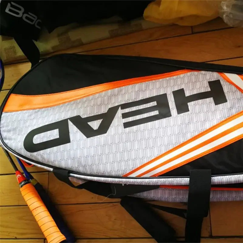 HEAD tennis racket backpack in white/gray with orange trim, large capacity for 3–6 racquets and shoe compartment
