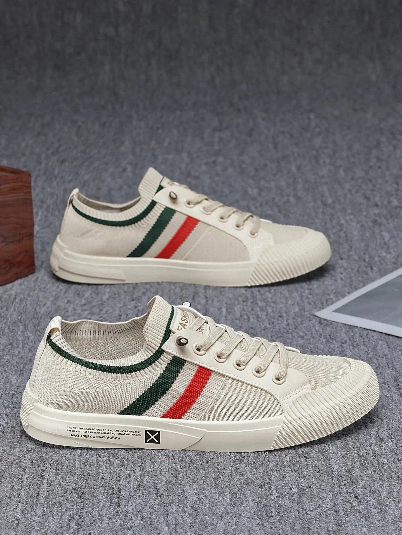 Men's cream driving sneakers with green and red side stripes, rubber sole