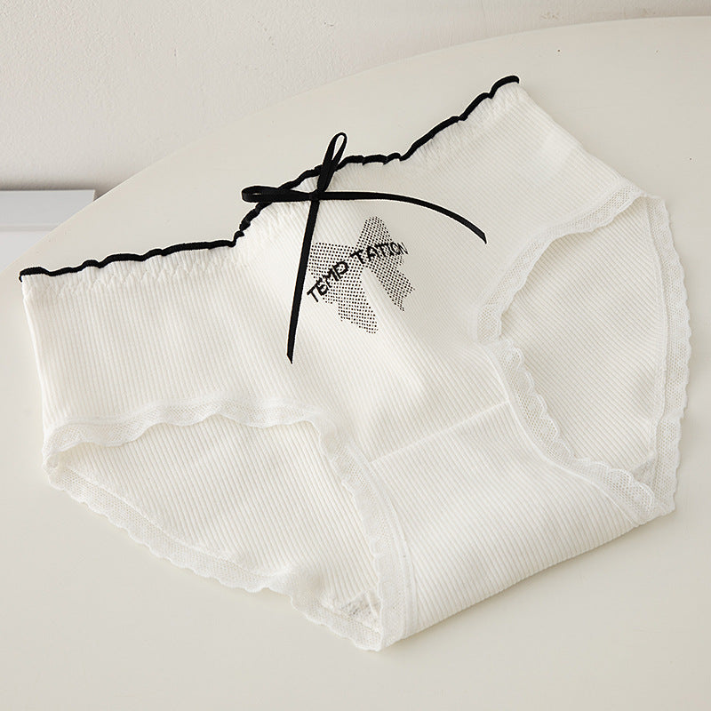 Women’s white ribbed underwear panty with lace trim and black bow detail