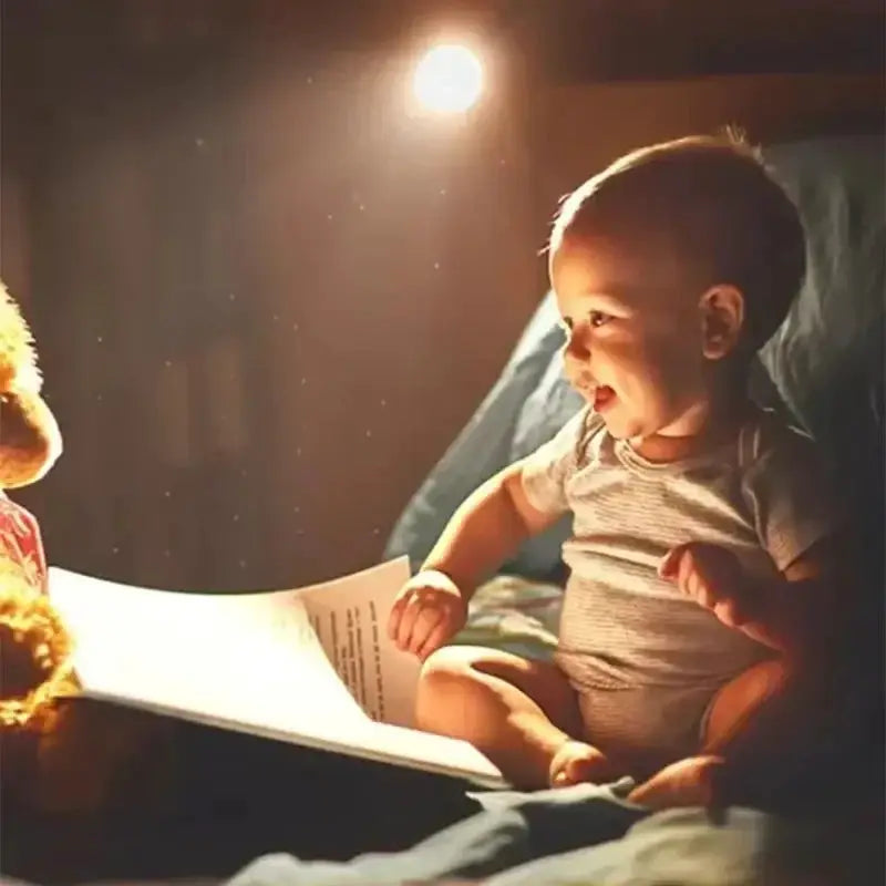 LED night light with motion sensor; warm bedroom scene with a baby reading beside a teddy bear