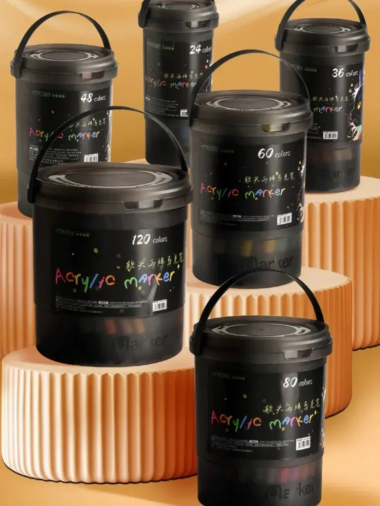 Bucket-cap acrylic marker set by Simples Market, six buckets with 24–120 colors.