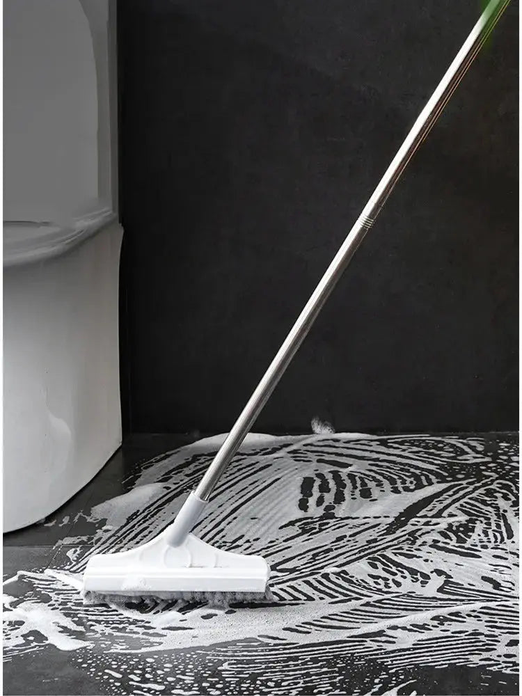 Bathroom floor wash brush by Simples Market with long metal handle and white head