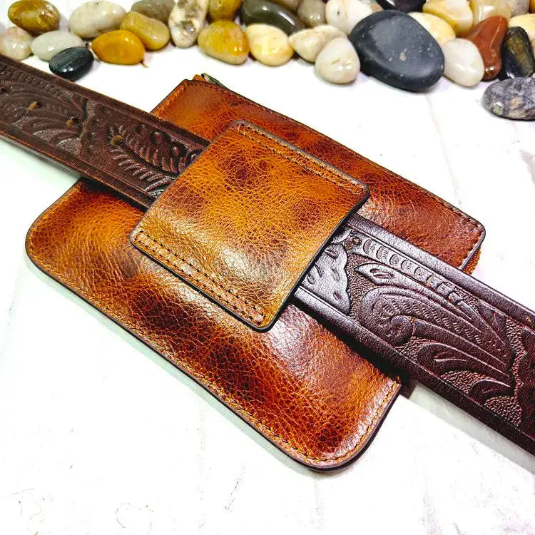 Leather belt bag with attached card holder and zipper pocket, brown embossed leather.