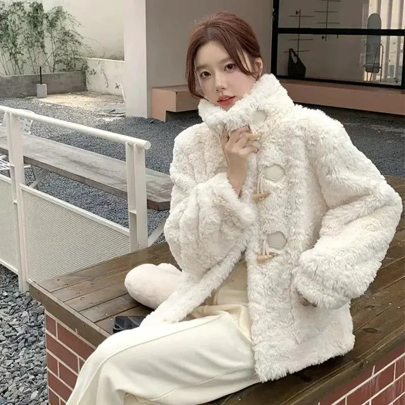 White faux-fur women's coat with oversized fit and toggle closures by Simples Market