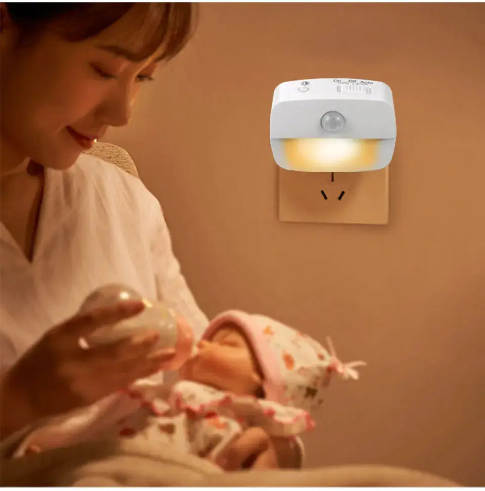 Wireless LED motion sensor night light by Simples Market, plug-in wall-mounted with warm white glow.