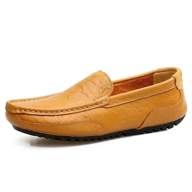 Tan leather men's loafers with moccasin stitching, slip-on driving shoes with black rubber outsole
