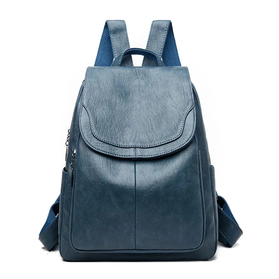 Genuine women's blue soft leather backpack with flap and adjustable straps