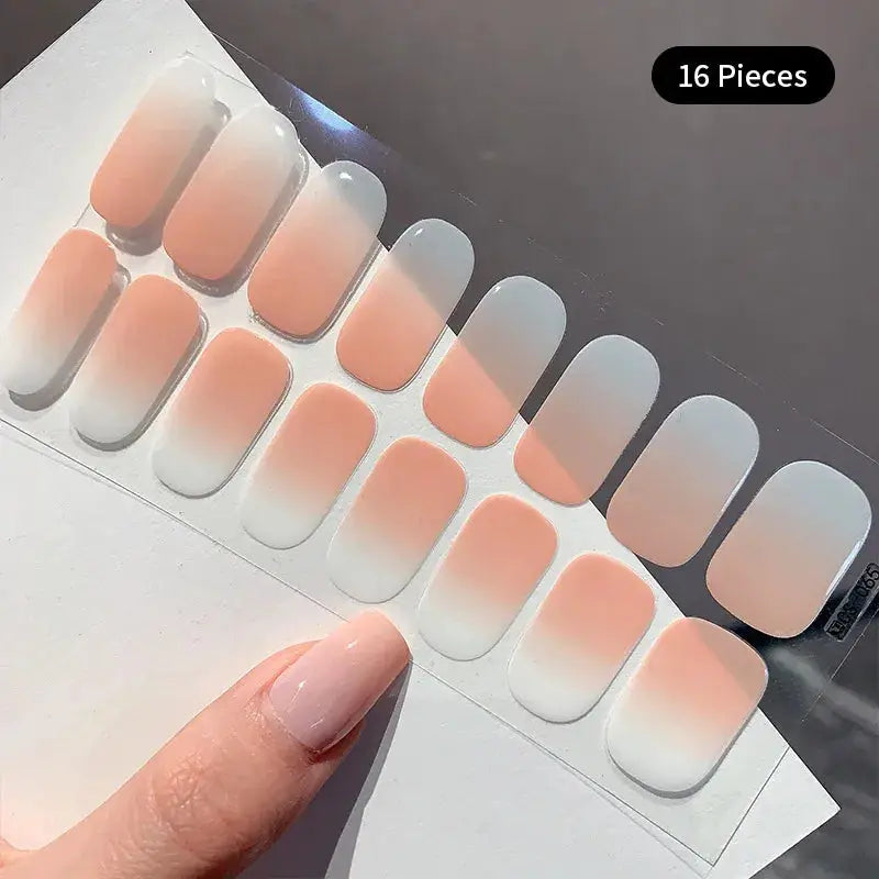 Press-on nail decals: 16-piece gradient sheet by Simples Market, peach-to-white full-cover design