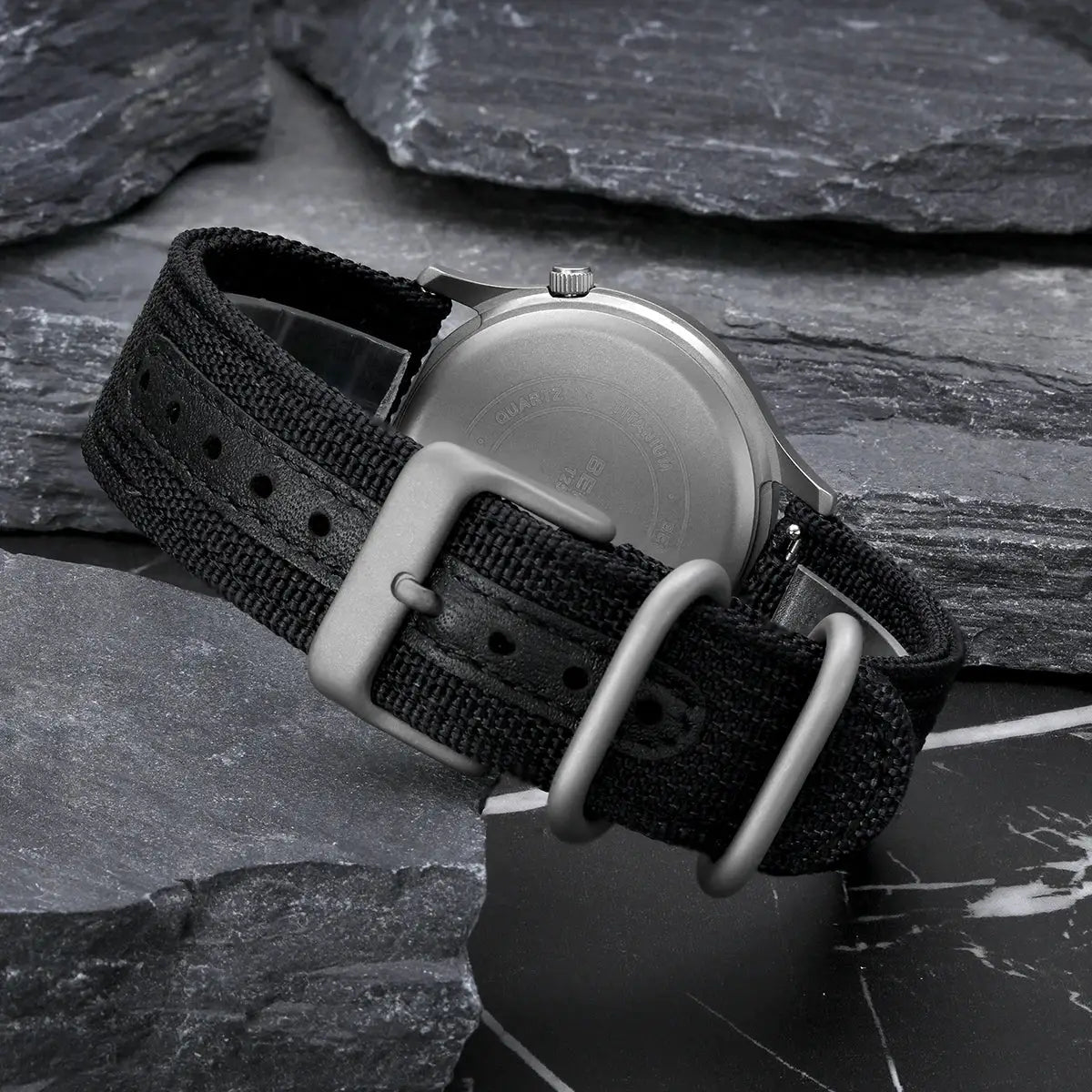 BERNY titanium men's field watch with black fabric strap and gray buckle
