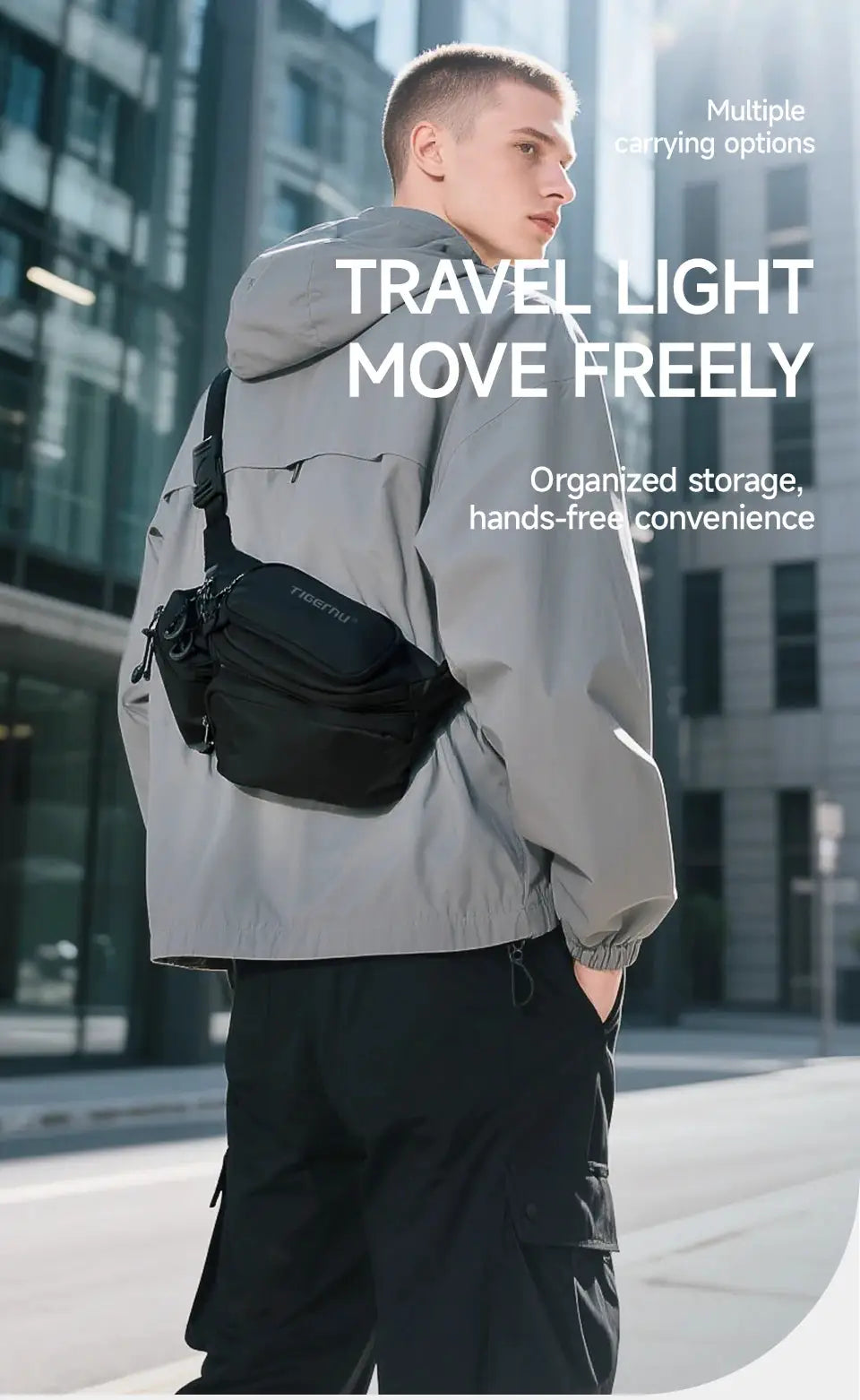 Tigernu chest bag, black crossbody bag worn by male model over a gray jacket
