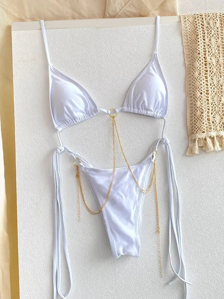 Simples Market white triangle chain bikini set with gold chain accents and thong bottoms