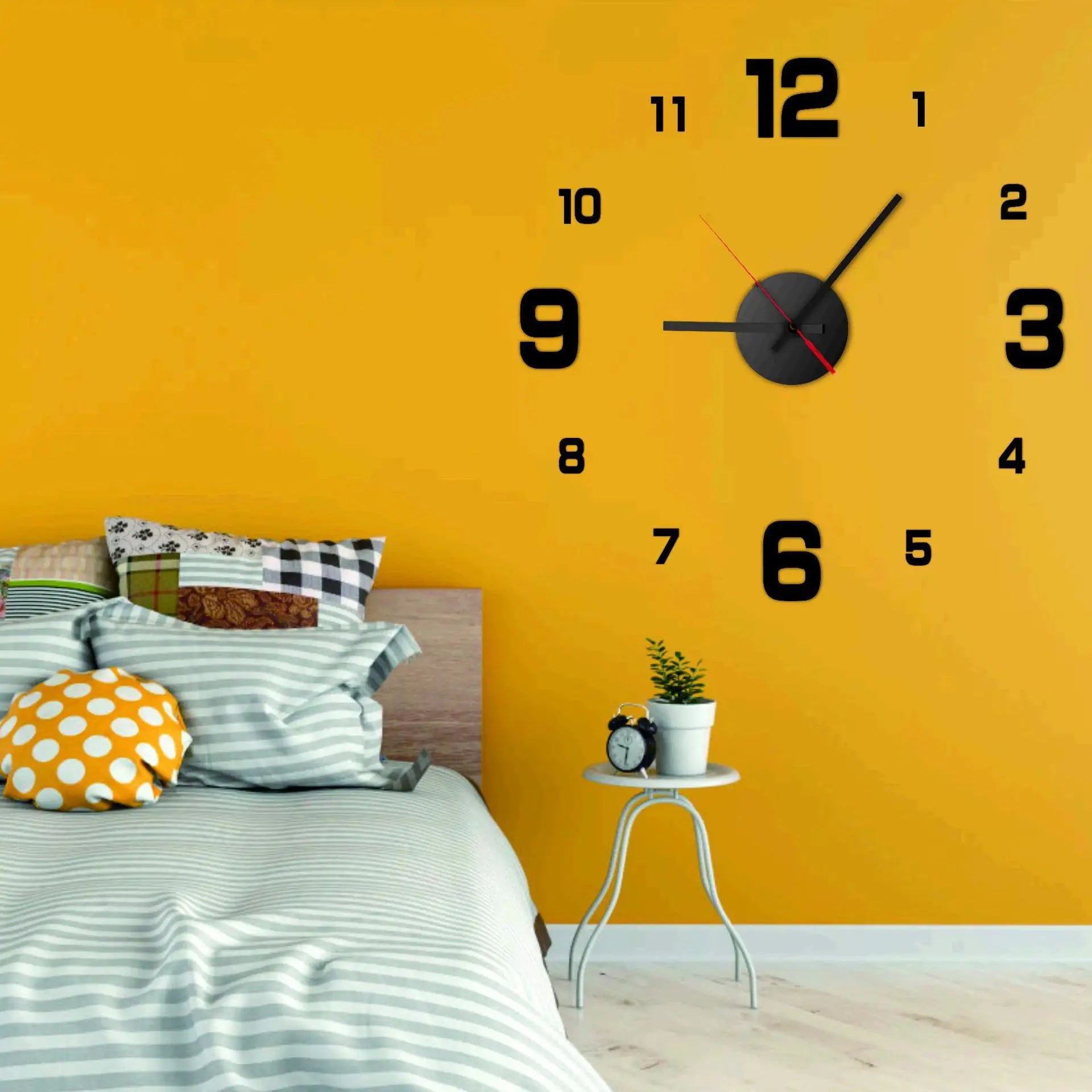 3D frameless wall clock wall sticker on yellow wall; large black numbers with black dial and red second hand