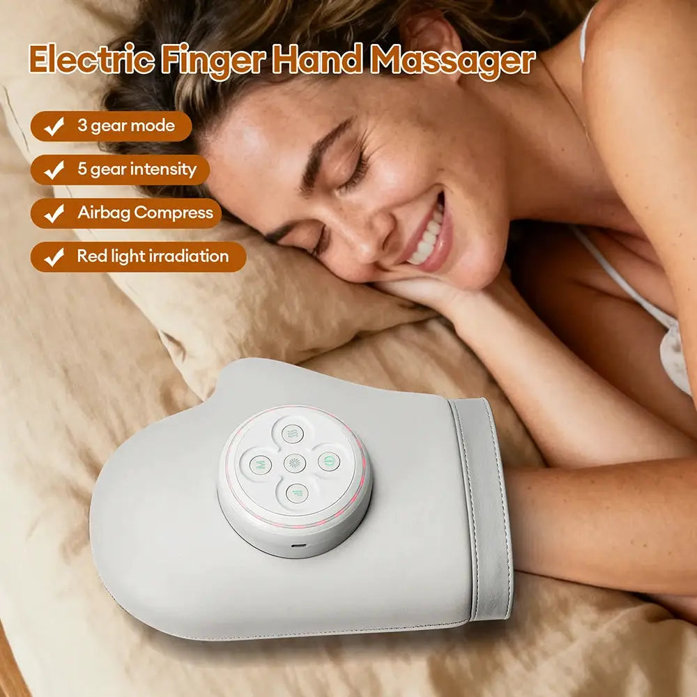 Simples Market electric finger hand massager glove in light gray with round control pad worn on forearm