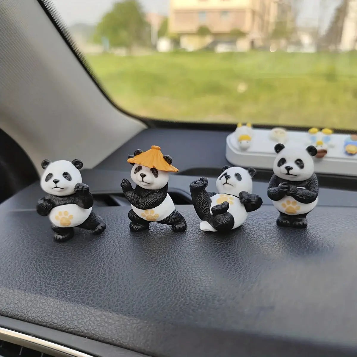 Panda design car ornaments 4pc set on dashboard; black-and-white panda figures by Simples Market