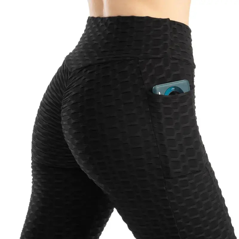 Simples Market women’s pocket bubble leggings in black, stretchy high-waist gym pants with phone pocket.