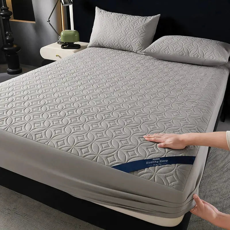Mattress protector by Simples Market; ultrasonic quilted, waterproof antibacterial, breathable, 30cm deep pocket.