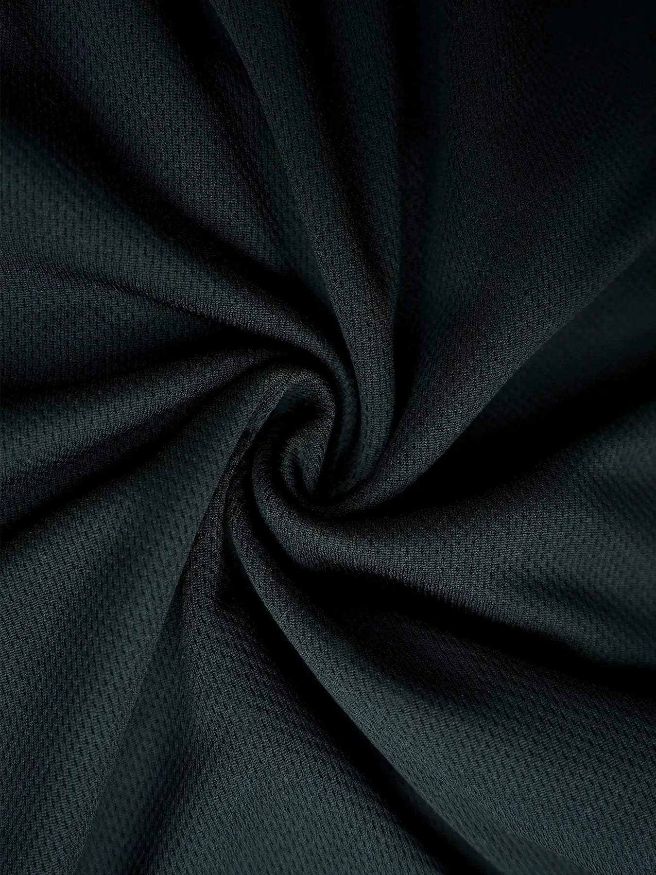 Y2K performance shorts fabric close-up in black knit; Simples Market gym shorts