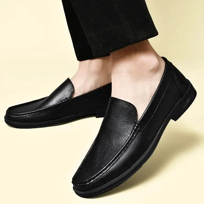 Leather men’s slip-on dress loafers in black by Simples Market for office wear