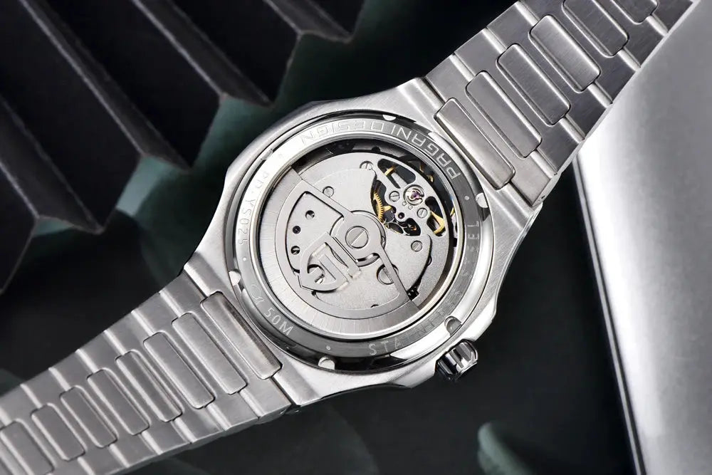 PAGANI DESIGN 2026 men's skeleton automatic watch with stainless steel bracelet and see-through case back.