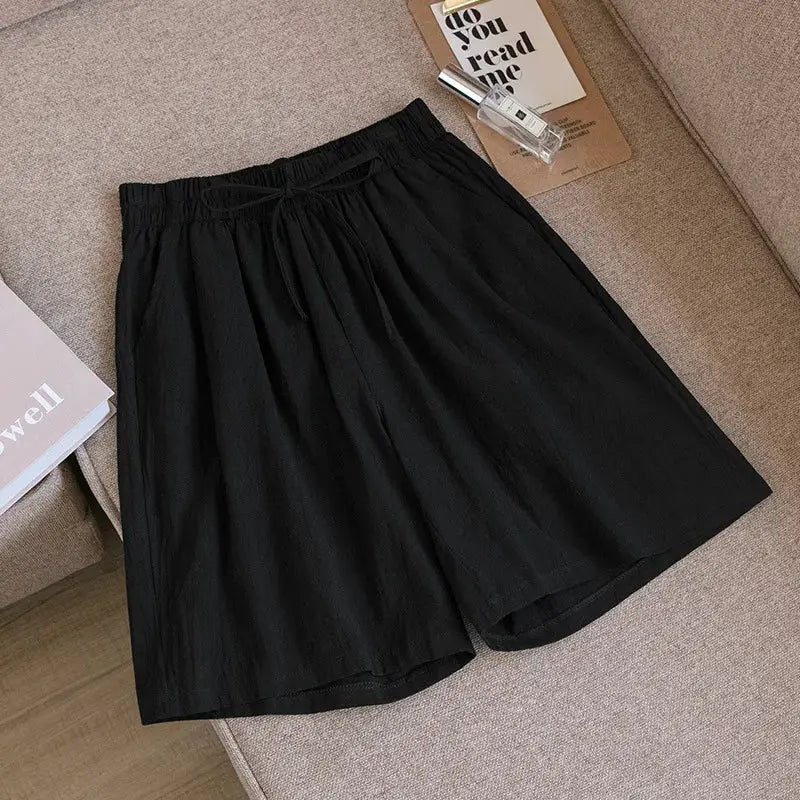 Women's cotton shorts by Simples Market, black high-waist loose-fit with drawstring and pockets