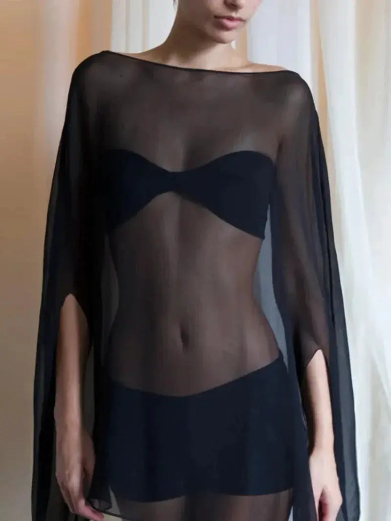 See-through chiffon blouse cover-up, black with long sleeves worn over a black top