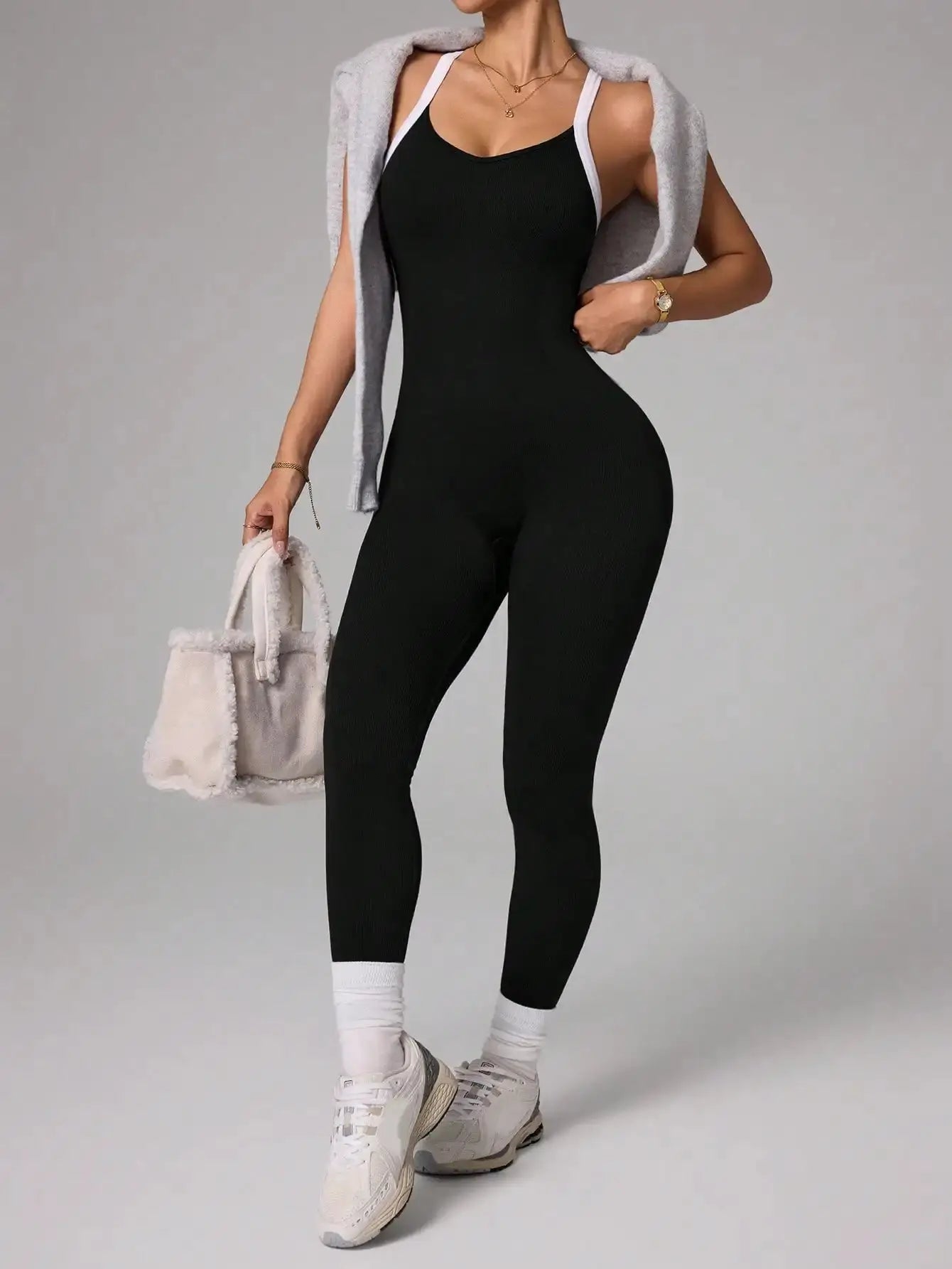 Simples Market black cross-strap jumpsuit; seamless, quick-drying yoga/fitness suit with white trim
