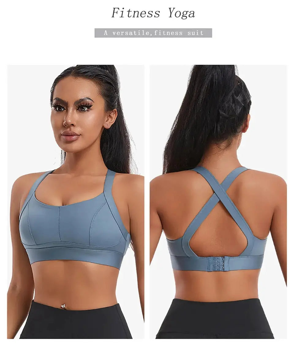 Women's high-impact sports bra by Simples Market in blue-gray with criss-cross back straps; padded.