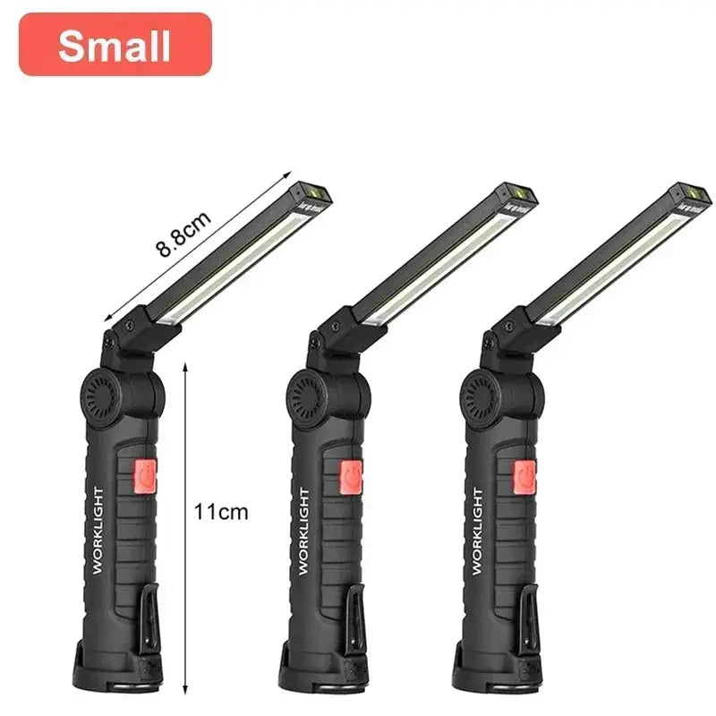 Three black portable COB LED work lights with adjustable hinged heads and magnetic hooks.