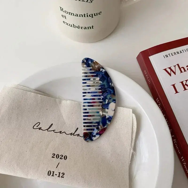 Wide-tooth acetate hair comb with a colorful blue pattern, anti-static massage styling tool.