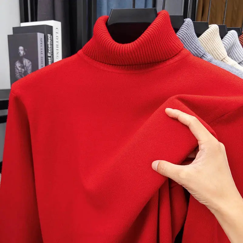 Red knitted turtleneck men's sweater with long sleeves; solid color knit pullover.