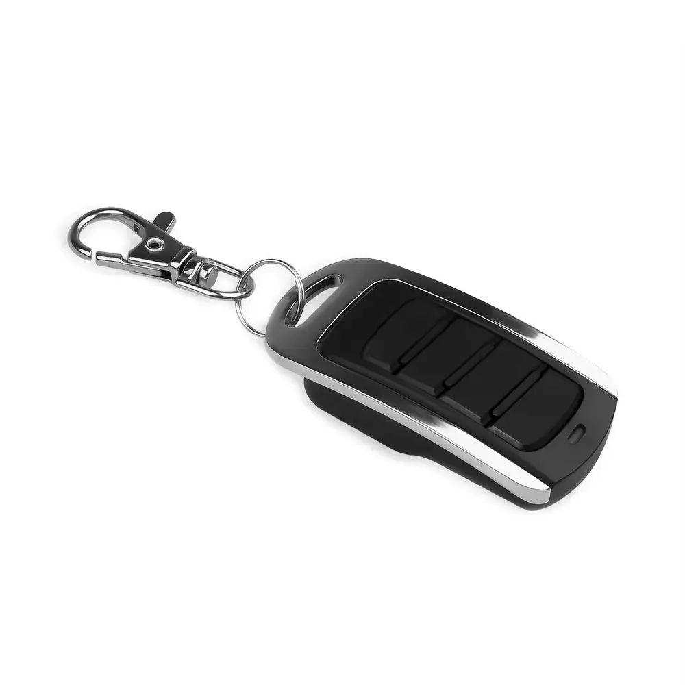 Simples Market four-button garage door remote key fob, black with chrome trim and attached keychain